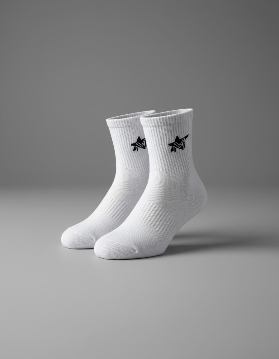 White socks with black logo on a black surface