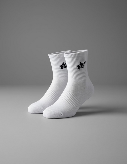 White socks with black logo on a black surface